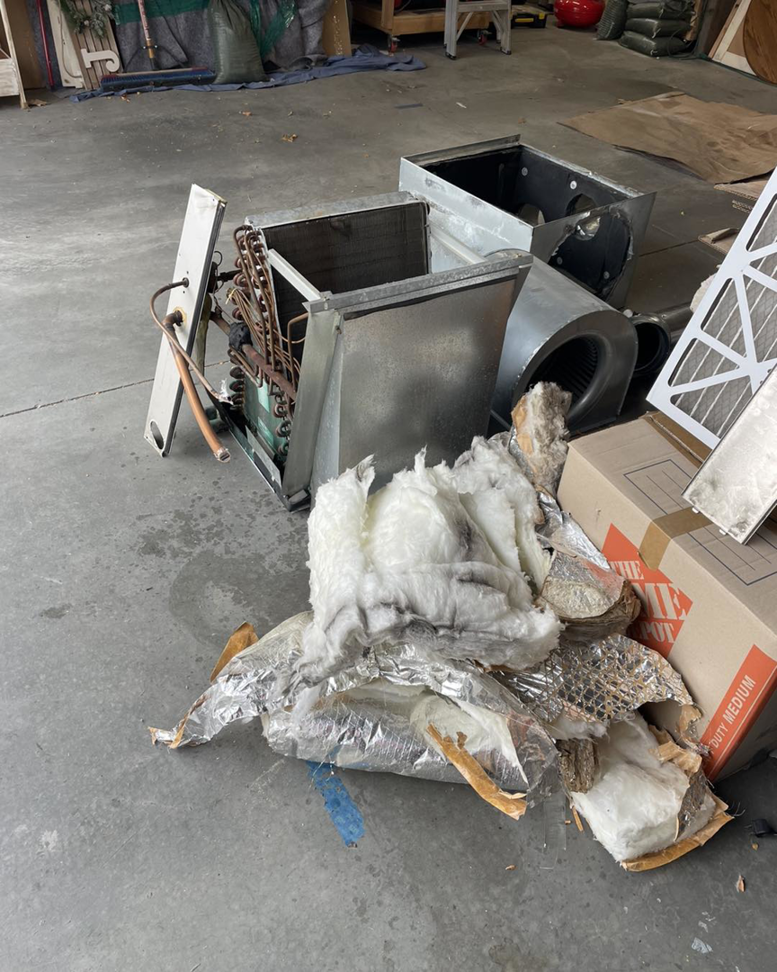 Discarded old HVAC equipment and components after a replacement service by AC Heating & Cooling in Meridian, ID.