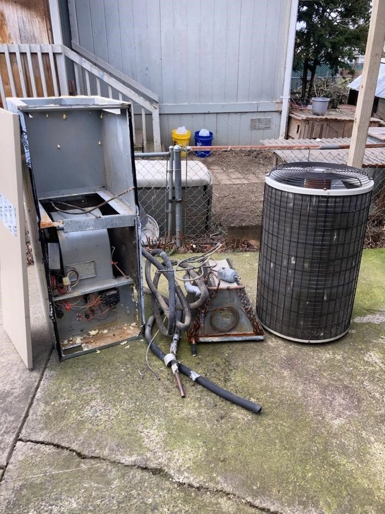 Old HVAC units removed for replacement by S&A Heating And Cooling in Cornelius, OR.