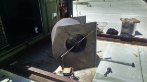 An old industrial fan unit removed for general junk removal by GHC Mechanical Services in Elk Grove Village, IL.