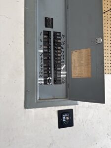 A close-up view of an open electrical breaker panel serviced by LivElectric in Garner, NC.