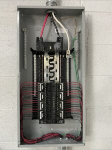 An open electrical breaker panel showing neatly organized wiring and circuits, installed by Muse Electricians in Los Angeles, CA.