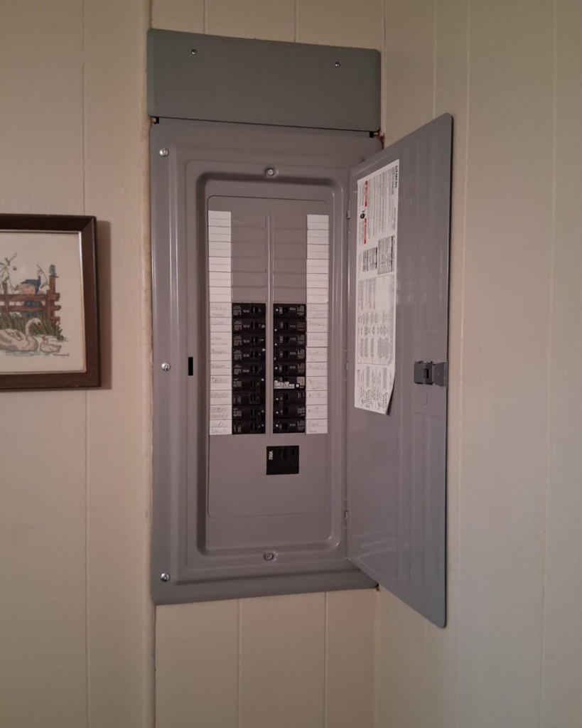 An open electrical panel or breaker box, a common service provided by Mr. Electric of Lakeland, FL.