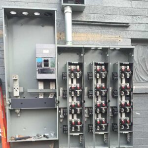 An open electrical panel showing circuit breakers during installation by Goal Electric LLC in West Valley City, UT.