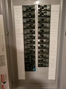 An open electrical panel with clearly labeled circuit breakers, installed by Interstate Electrical Contractors in Dalton Gardens, ID.