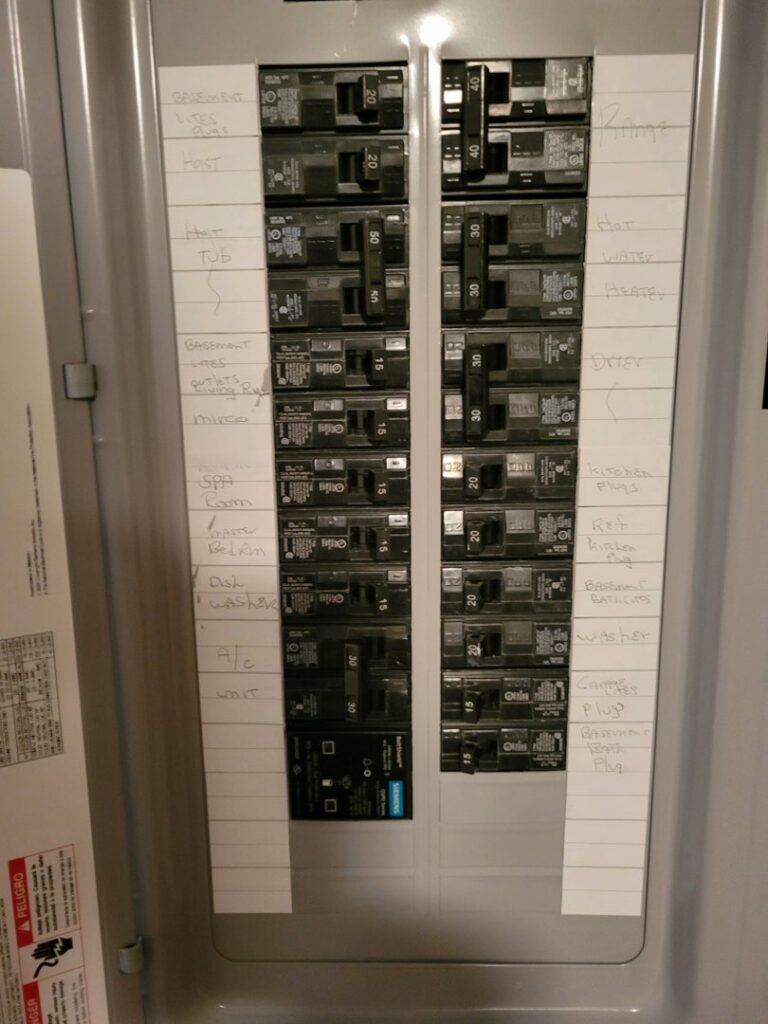 An open electrical panel with clearly labeled circuit breakers, installed by Interstate Electrical Contractors in Dalton Gardens, ID.