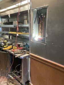 An open electrical panel showing bus bars and wiring during installation or repair by Ace Electric Inc. in Valdosta, GA.