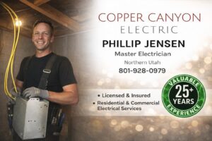 An open electrical panel showing circuit breakers and wiring during an inspection or service by Copper Canyon Electric in Farmington, UT.