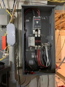 An open electrical service panel showing wiring and breakers, installed by MDMartin Electrical LLC in Philadelphia, PA.