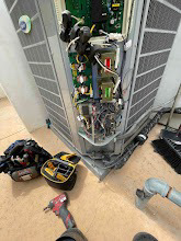 An open HVAC unit showing internal components and wiring during service by AD Mechanical Heating & AC Repair in Los Angeles, CA