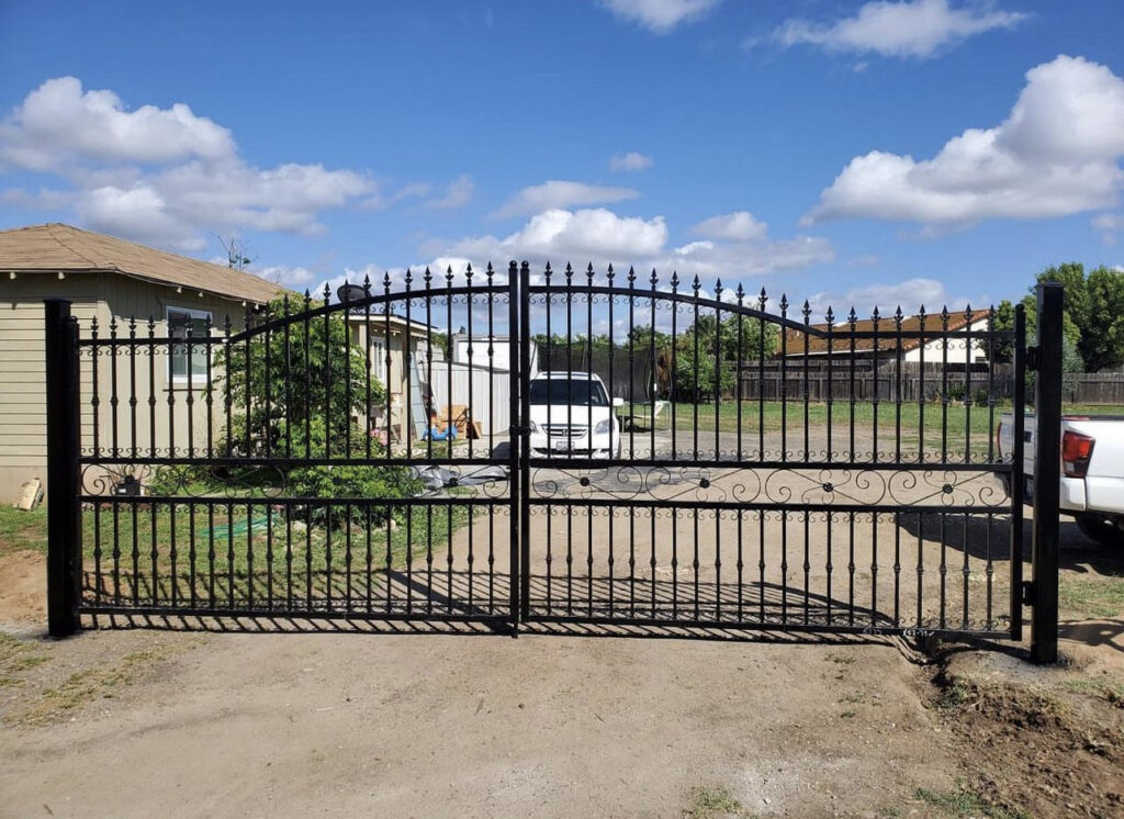 An ornate black wrought iron gate, a premium installation by San Diego Fencing Contractor A's Pro Build Fencing in San Diego, CA.
