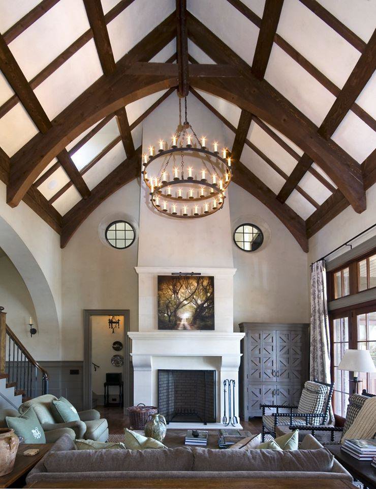 An ornate chandelier installed in a high-ceiling room by McCall Enterprises in Atlanta, GA.