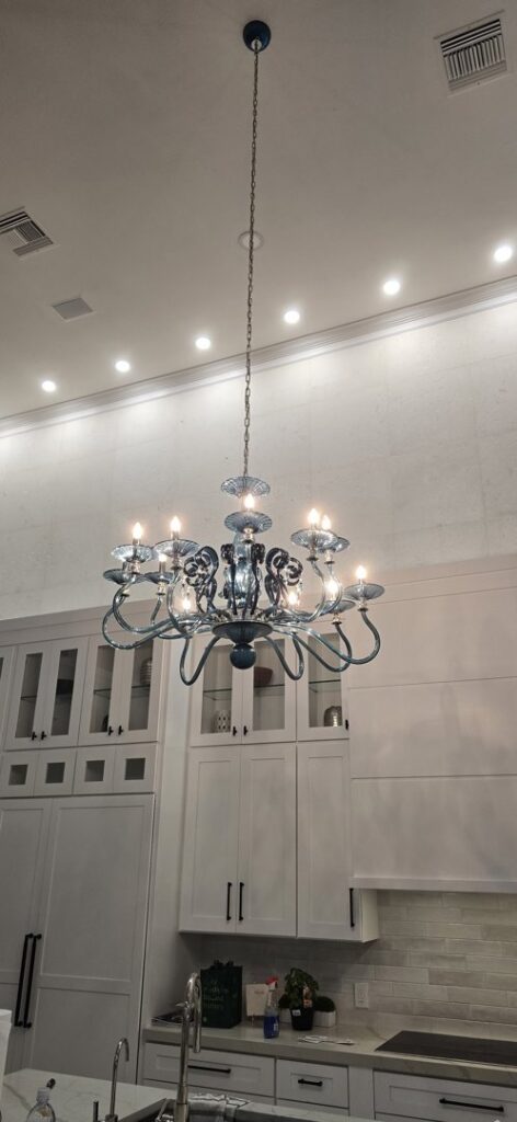A large, ornate chandelier professionally installed in a kitchen by Small Jobs Electric in Tampa, FL.