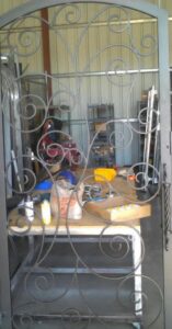 An ornate custom metal gate, showcasing welding craftsmanship by Done Wright Fencing and Welding in Denver, CO.