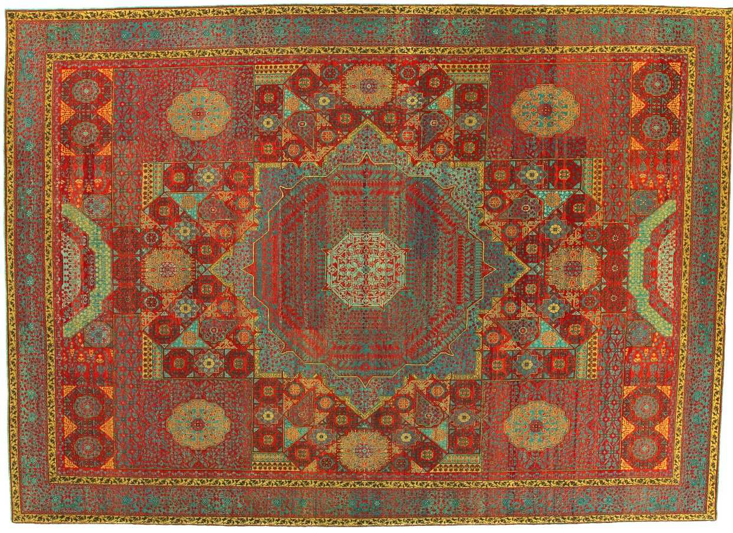 An ornate red and blue traditional carpet, showcasing the quality available from Woven Legends in Philadelphia, PA.