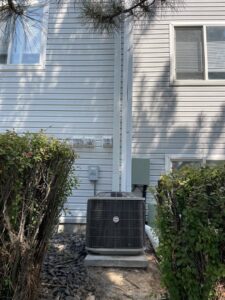 An outdoor AC condenser unit providing cooling for a home, serviced by AC Heating & Cooling in Meridian, ID.