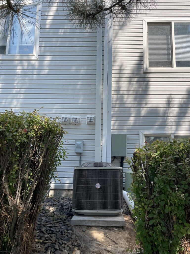 An outdoor AC condenser unit providing cooling for a home, serviced by AC Heating & Cooling in Meridian, ID.