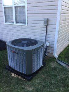 An outdoor air conditioning condenser unit installed by Honesty Services in Rock Hill, SC.