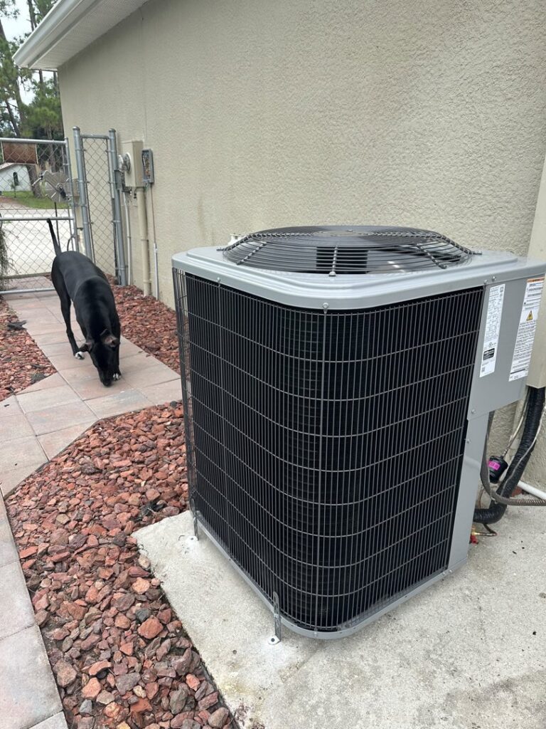 A newly installed outdoor AC condenser unit by Back Bay Heating and Cooling in Cape Coral, FL