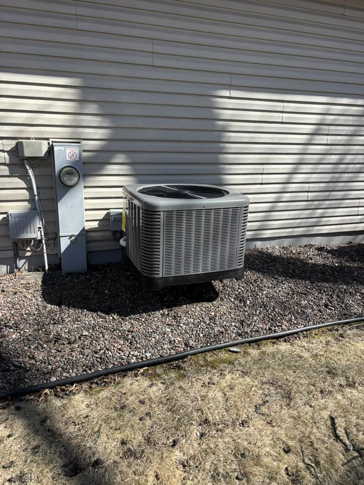 An outdoor air conditioning unit installed by Air Control Heating & Cooling LLC in Schererville, IN.