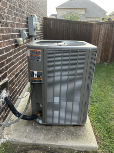 An outdoor AC unit showing electrical and refrigerant line connections installed by Sonnyreena Mechanical LLC in Garland, TX