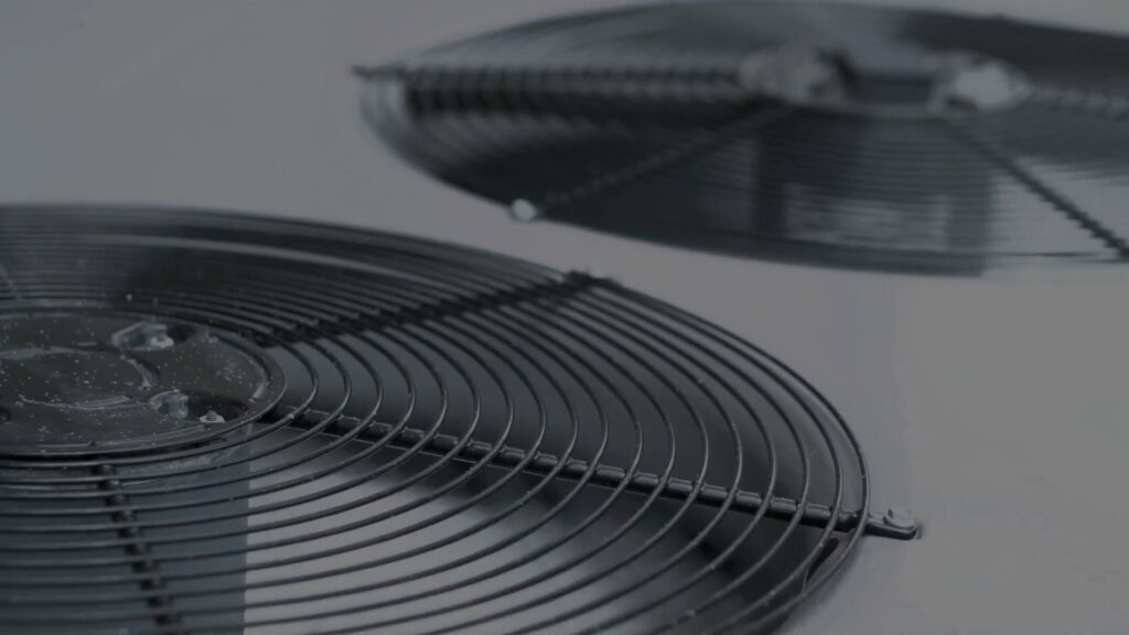 A clear close-up view of the fan grill on an outdoor air conditioning unit by S&S Mechanical in St. George, UT