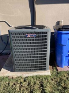 An outdoor air conditioning unit with the Goettl logo, serviced by Goettl Austin in Austin, TX