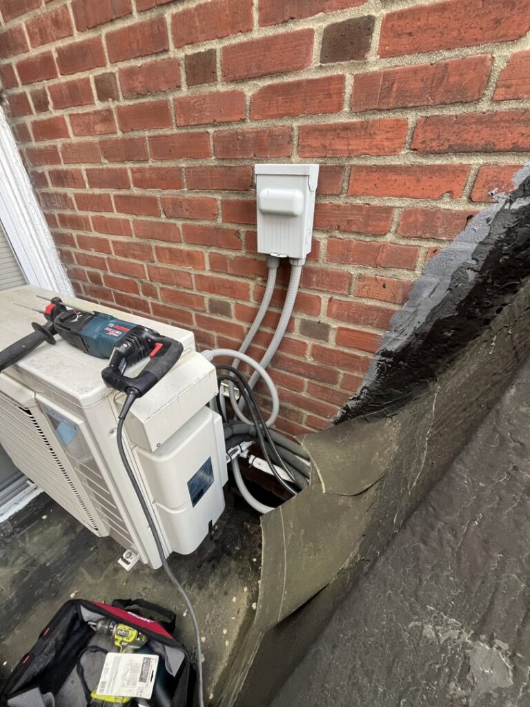 An outdoor AC unit installation in progress by Daniels HVAC Philadelphia LLC in Philadelphia, PA.