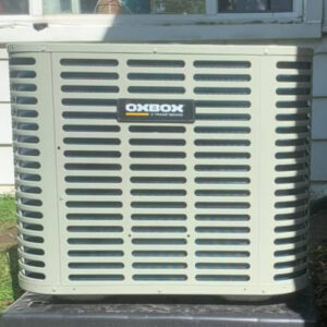 An outdoor Oxbox air conditioning unit installed by Detroit Metro Mechanical, Inc. in Harrison Township, MI.