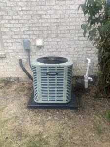 An OXBOX outdoor air conditioning unit installed by Good Helpers Heating, Cooling & Labor Services LLC in Detroit, MI.