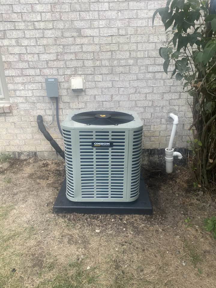 An OXBOX outdoor air conditioning unit installed by Good Helpers Heating, Cooling & Labor Services LLC in Detroit, MI.