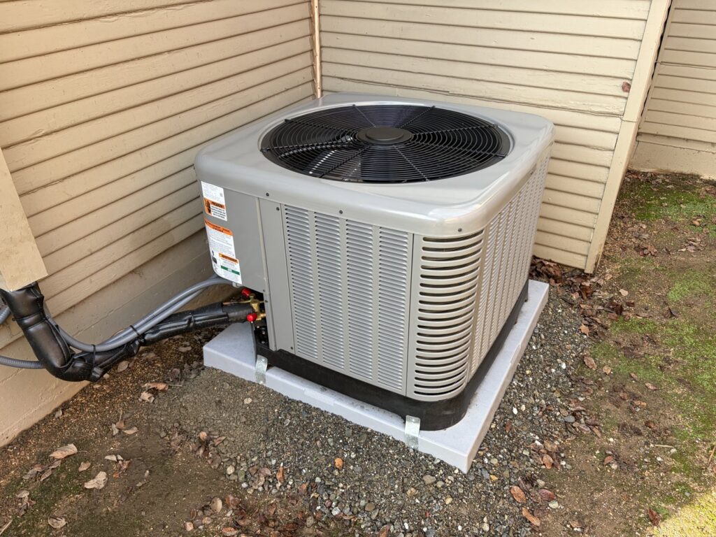 An outdoor AC unit installation by Jaguar Heating & Air in Sacramento, CA