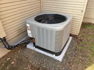 An outdoor AC unit installation by Jaguar Heating & Air in Sacramento, CA