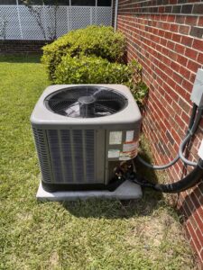 An outdoor air conditioning unit installed by Miller's Home Comfort-Chesapeake in Chesapeake, VA.