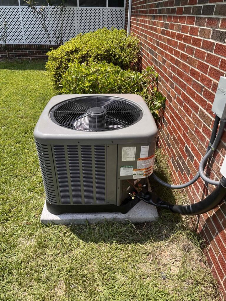 An outdoor air conditioning unit installed by Miller's Home Comfort-Chesapeake in Chesapeake, VA.
