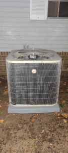 A Payne brand outdoor AC unit professionally installed next to a home by Air Mechanics, LLC in Greensboro, NC.