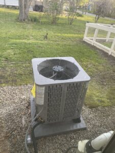 A newly installed outdoor air conditioning unit by Roy Rogers Heating and Air in Indianapolis, IN.