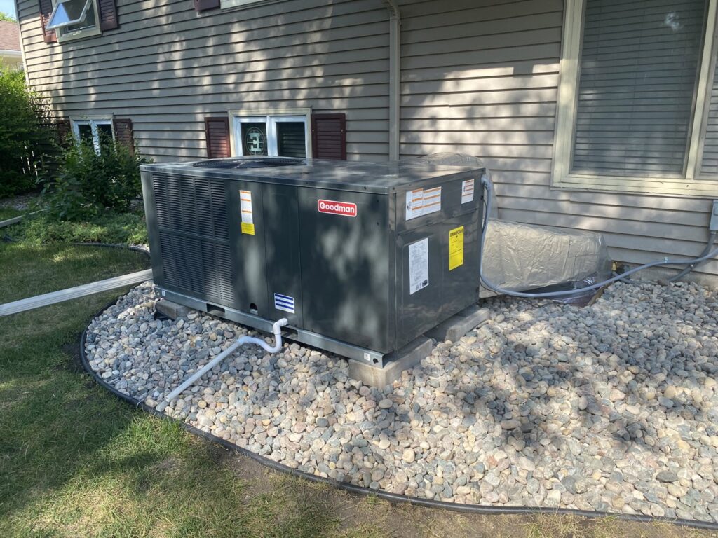 A newly installed Goodman outdoor air conditioning unit by True Comfort Heating and Cooling in Sherwood, AR.