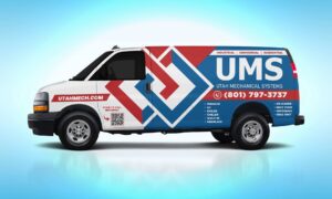 An outdoor air conditioning unit installed next to a brick wall by Utah Mechanical Systems in South Ogden, UT.