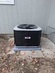 An outdoor AC unit installation by Vega Heating and Cooling in Kansas City, KS