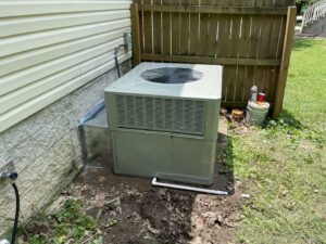 An outdoor air conditioning unit recently installed or replaced by Gouker's Best Air in Franklin, TN.