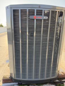 An outdoor Trane XR air conditioning unit installed on a rooftop by A and R Air Conditioning & Heating furnace in San Jose, CA.