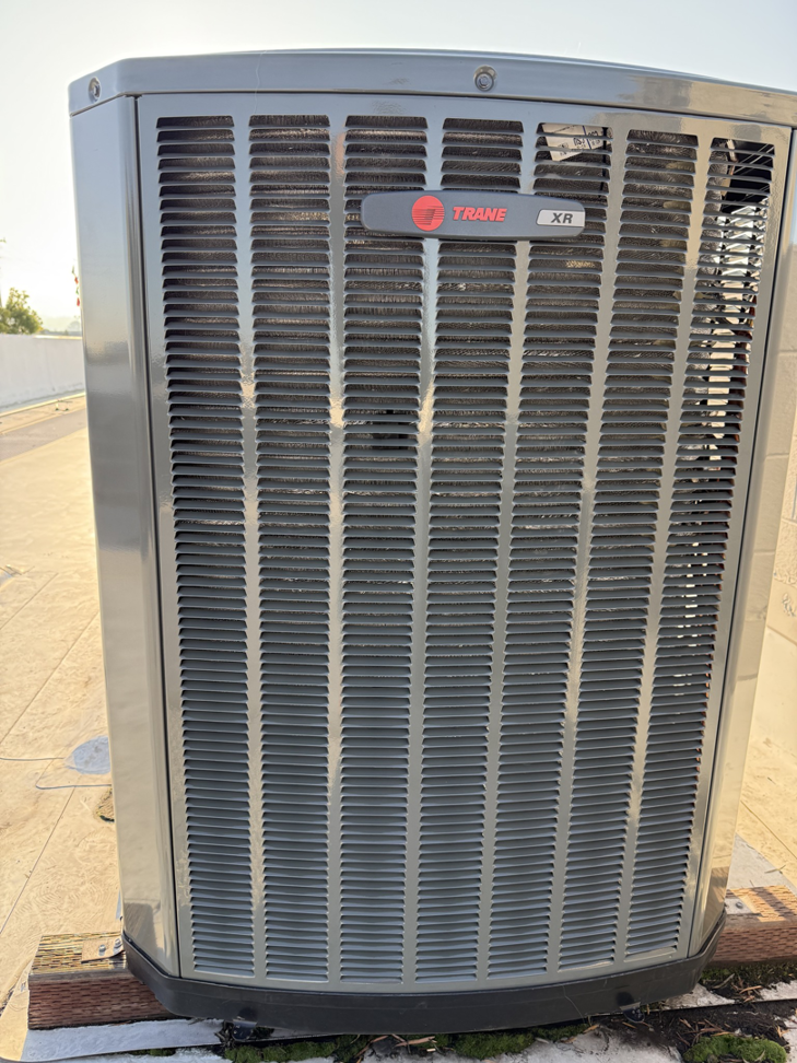 An outdoor Trane XR air conditioning unit installed on a rooftop by A and R Air Conditioning & Heating furnace in San Jose, CA.