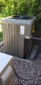 An outdoor air conditioning unit being serviced or installed by Brisk Air Inc in Phoenix, AZ.