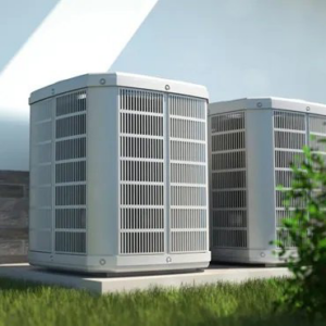 Two modern outdoor AC units providing cooling for a home or business by Desert Peaks in Phoenix, AZ.