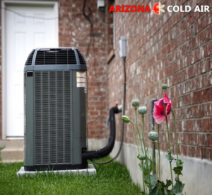 An outdoor air conditioning unit next to a brick house, representing HVAC services from Arizona Cold Air in Mesa, AZ.