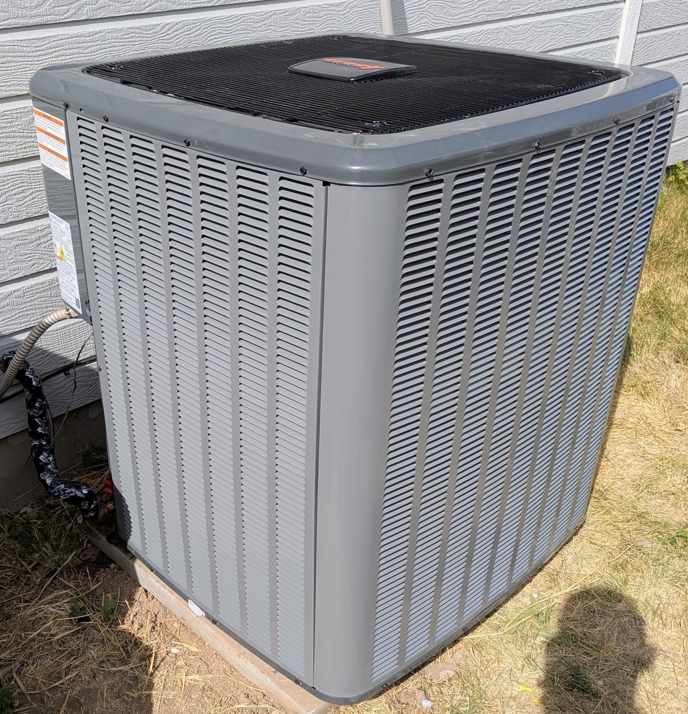 A modern outdoor air conditioning unit installed by Heritage Heating and Air Conditioning in Nampa, ID