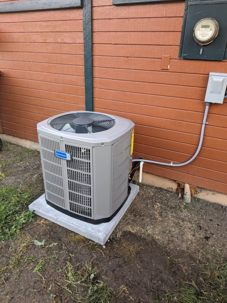 An outdoor air conditioning unit installed by Elevate Heating & Cooling in Hillsboro, OR.