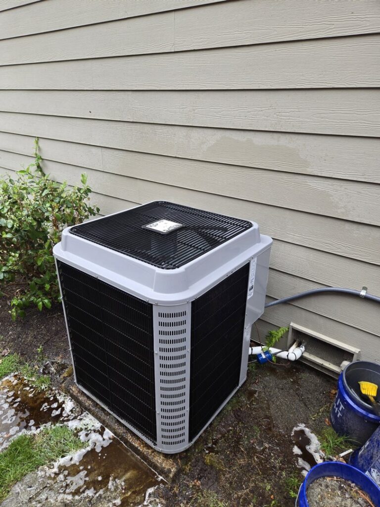 A modern outdoor air conditioning unit installed by Sound Comfort Heating & Air Conditioning in Everett, WA.