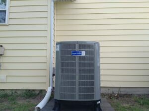 An outdoor American Standard air conditioning unit installed by Specialized Service Heat & Air in Wichita, KS.