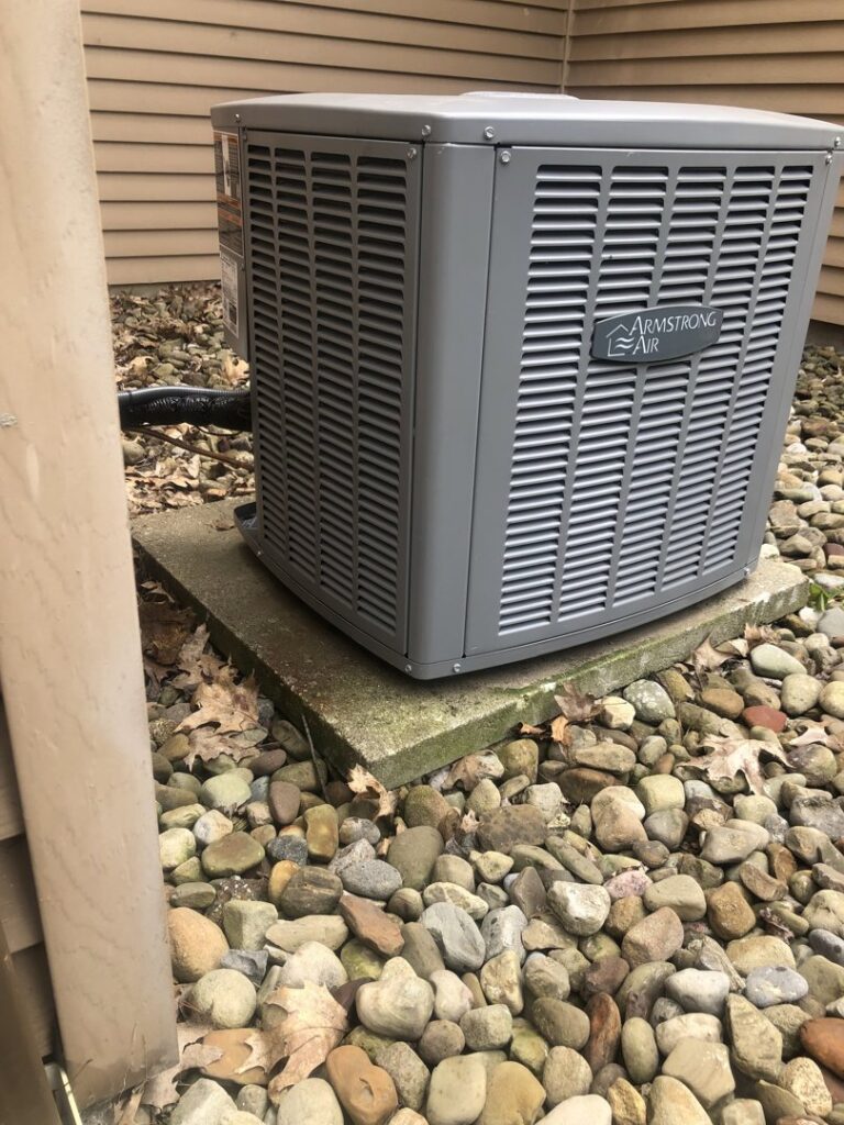 An outdoor Armstrong Air conditioning unit installed by Ohio City Heating and Cooling in Cleveland, OH.
